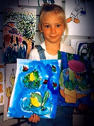 Elyse Bobczynski Age 5 holding original watercolor of Frogs